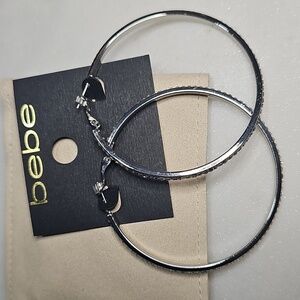 Bebe Shimmering Silver Hoop Earrings